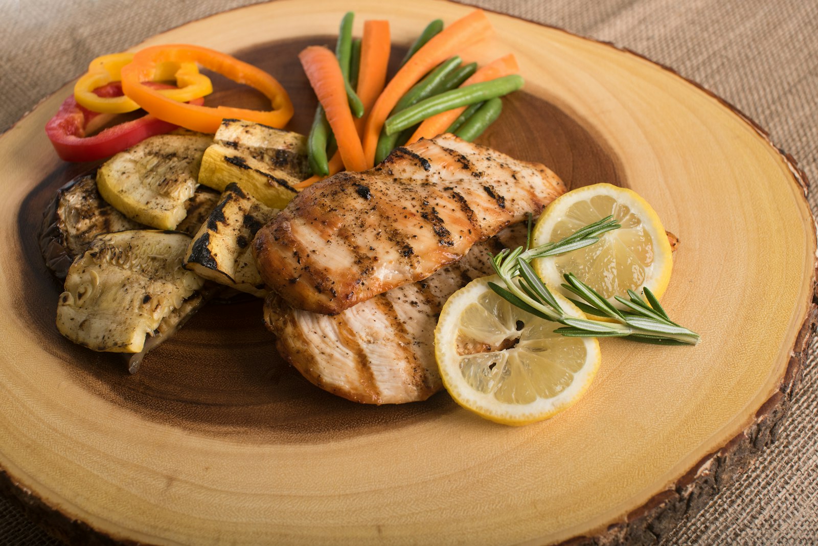 Garlic herb chicken thighs with crispy golden skin roasted over buttery potatoes in one pan
